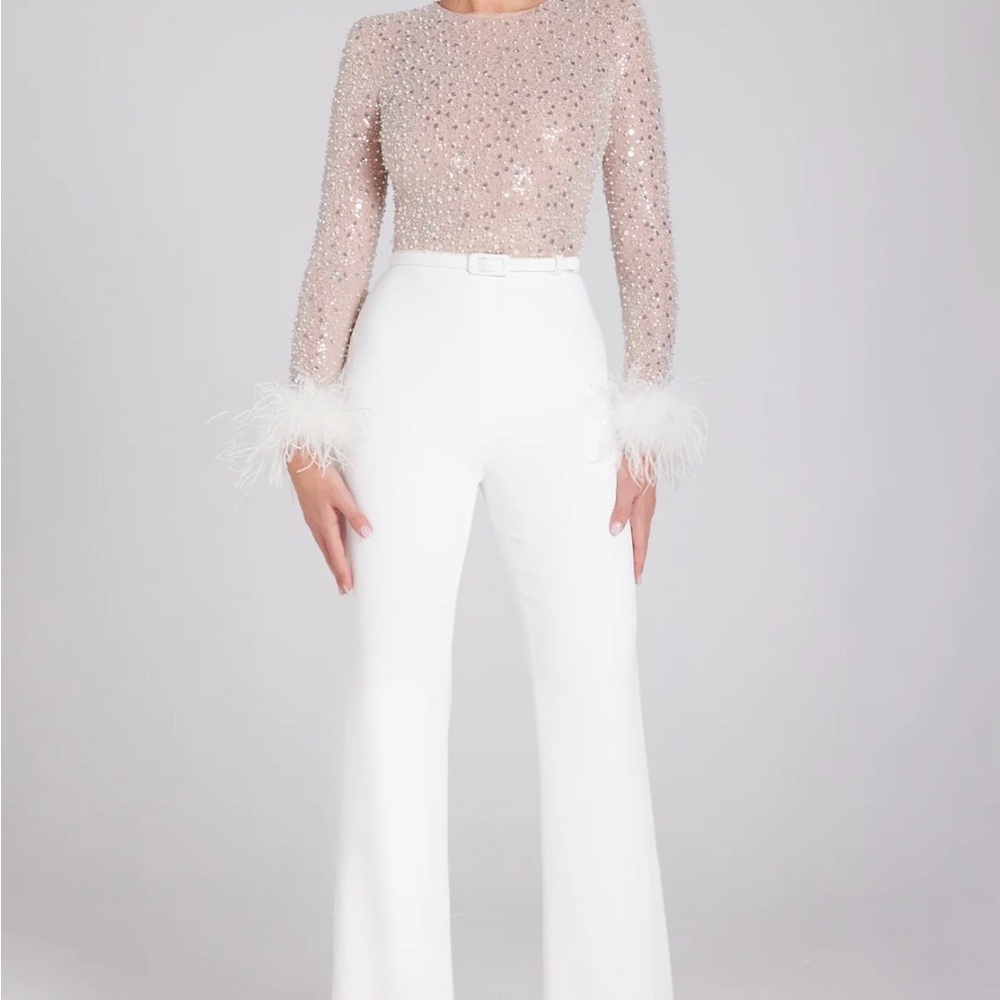 Nadine Merabi Elegant White Jumpsuit with Feather Details